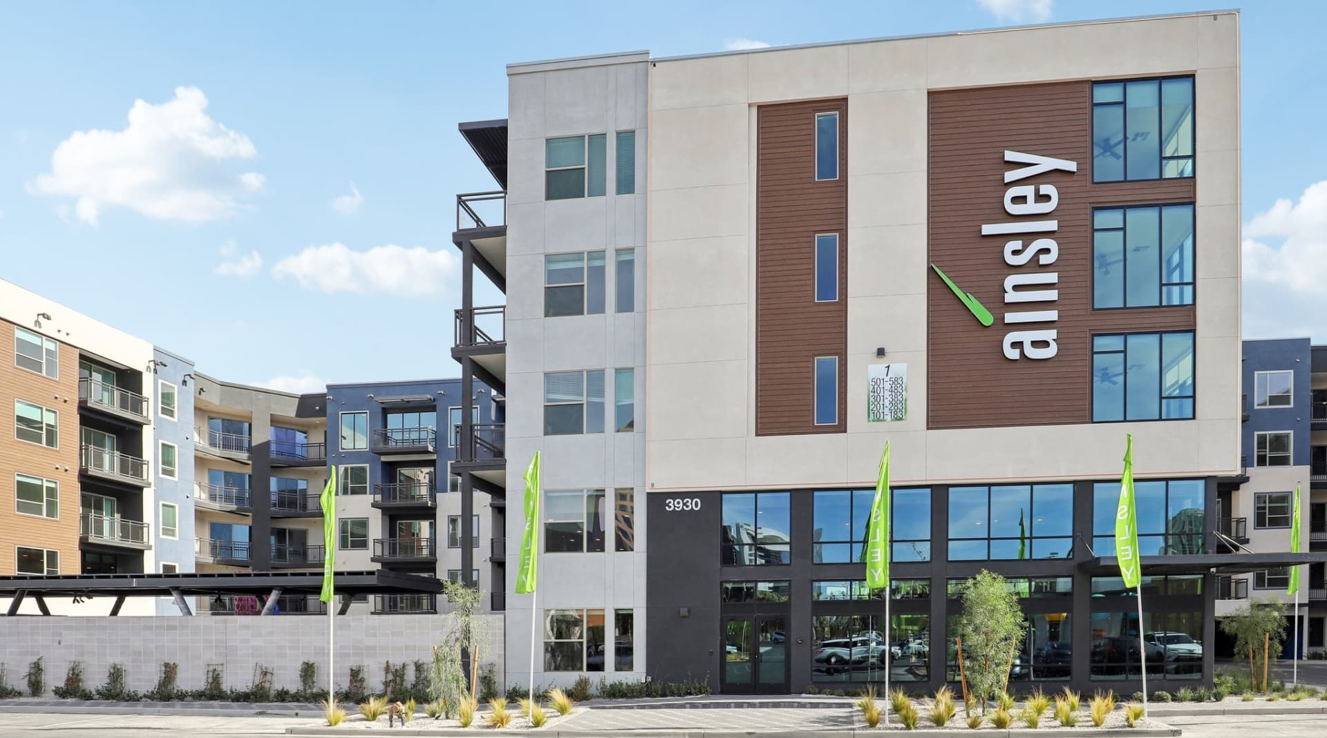 Luxury apartment exterior with Elysian branding