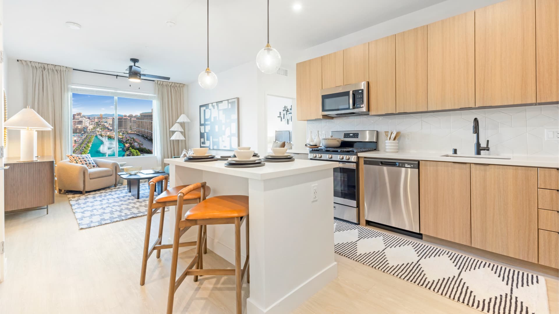 Bright open-concept apartment kitchen and dining area